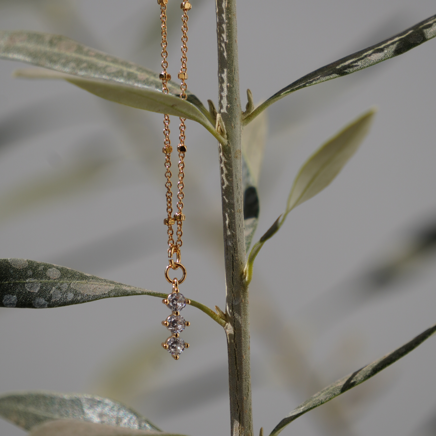 STB,  TRINITY GLOW NECKLACE