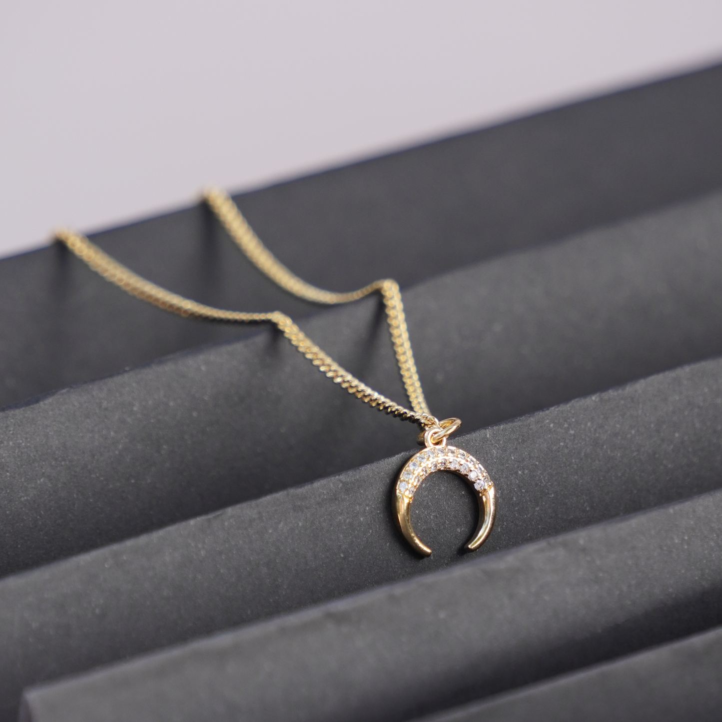 STB, DOWNWARD CRESCENT NECKLACE